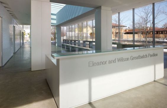 The ticket counter is the first stop for visitors before they enter the visitor's education center. To enhance the daylight admitted by the curtain wall, a skylight runs down the center of the space. "Glass pavilions are very nice from the exterior, but they also tend to be dark at the heart," Mori says. The skylight makes it easier to read displays, by graphic design firm 2x4, especially during one of Buffalo's 310 cloudy days each year.
