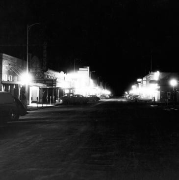 The lights come on for the first time in an unidentified schoolroom and the downtown of Shelby, Mont. Now children could study at night and were relieved of many manual chores—both of which helped kids stay in school, according to teachers from the time. Electricity also brought people together at schools, stores, and churches after working hours. Lights redefined “downtown” in small communities.