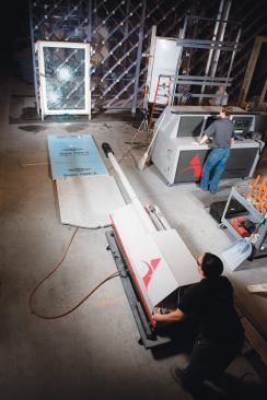 An air cannon is used to fire variously sized timber pieces at windows for impact testing. Like almost all of ATI's equipment, it was designed and manufactured in-house.