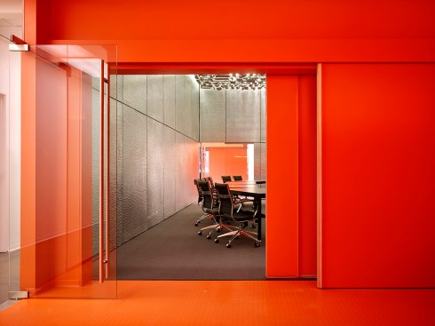 32 plasma screens transform the presentation room into a box of information and light.  A place where information technology becomes palpable.  