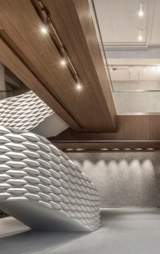 The staircase has been designed using parametric software rather than being drawn by hand to accentuate the characteristics of the Financial Technology industry.