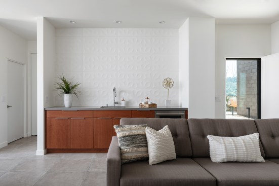 Casita/guest area off the main entry area.  A 3d tile back splash runs from counter to ceiling at the guest kitchenette.