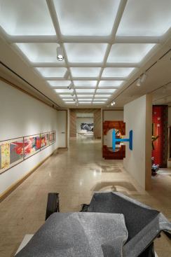 A view of the south gallery with the addition of  the fully directional accent lighting.