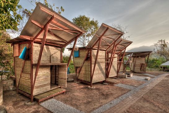 The siding of the Soe Ker Tie Hias (Butterfly Houses) in Noh Bo, Tak, Thailand, uses a local bamboo-weaving technique.