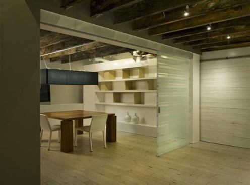 2-door EXTENDO design; opened, accenting shared floor surface between rooms.