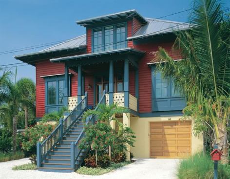 CUSTOM HOME, March 2004  Beach Treat  Cooper Johnson Smith   Whether it's owner-occupied or rented out, this Pass-A-Grille, Fla., home must be able to withstand tropical storms, hurricanes, and the rigors of everyday beach weather. Builder Rick Worley constructed&nbsp;it atop underground pilings of wood encased in concrete.The building's lower level consists of concrete and masonry, with breakaway walls of concrete block to let storm water run right under the house. Continuous steel rods run up from the concrete base through the wood-framed main and second floors, pinning the structure to its site.