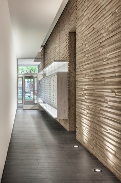 Residential lobby, lined with striated concrete