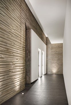 Residential lobby, lined with striated concrete