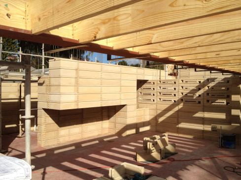 The stack-bonded blocks are called “textile” blocks for the vertical and horizontal reinforcements woven between them. 