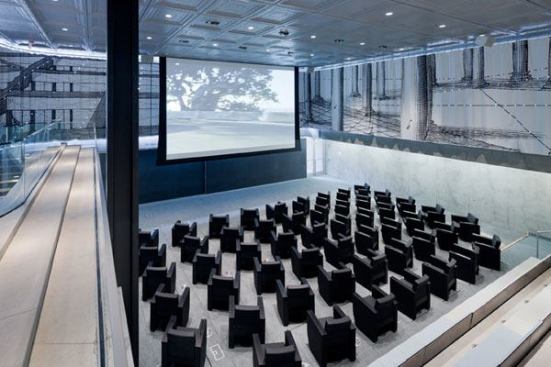Accent lighting for the front of the auditorium is provided by halogen AR111 accent lights.