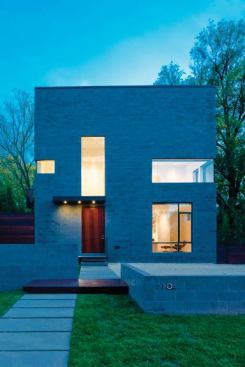 Corner window cutouts add depth to this geometric fa&ccedil;ade. Project: Hampton Lane House, Bethesda, Md.; Architect: Robert M. Gurney, Washington, D.C.; Builder: Freedom First Homes, Bethesda, Md.