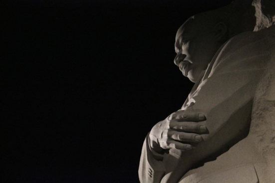 A detail of Dr. King’s silhouette in the Stone of Hope as seen at night.