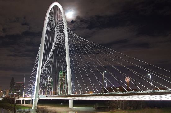 The Margaret Hunt Hill Bridge, with the Dallas skyline beyond, at its lighting ceremony on Jan. 10, 2012.