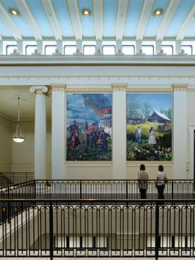 The second-floor atrium space is a generous 33 feet wide and is lined by 16 oil-painted panels by artist Caleb O?Connor, which depict major events in the region?s history.