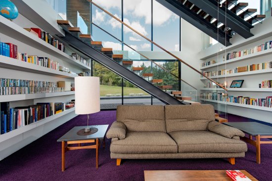 Walker Road modern home bright reading room library and floating stairs