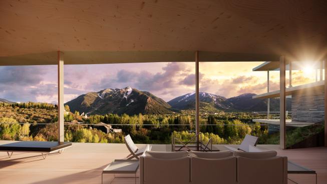 Intimacy and warmth are introduced through interior wood floors and ceilings, locally sourced stone fireplaces and walls that wrap the perimeter where the pavilions carve into the mountain.