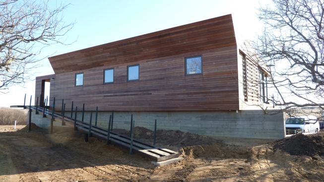 Single-family custom houses have always been the firm’s bread-and-butter even as it expands into other markets. This compact house sits on top of a dune in Aquinnah on Martha’s Vineyard. Only four materials were used in the entire house: wood, bronze, glass, and concrete.
