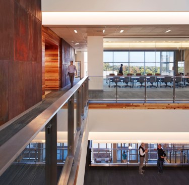 Generous open corridors along the perimeter of the atrium as well as conference rooms provide gathering areas for those working here:  employees pass through the atrium at least a couple of times a day.