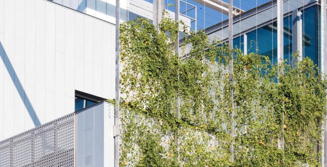 Bringing nature to the neighborhood, on the south and west fa?ades, a trellis is bracketed off the building face on a galvanized steel frame.