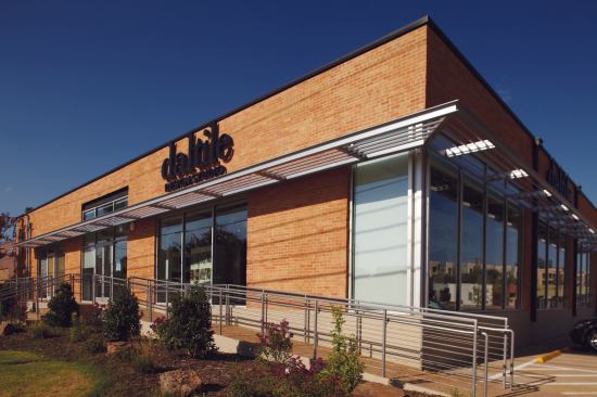 The Daltile Design Studio's exterior capitalizes on its corner location to showcase large displays of tile in its storefront windows.