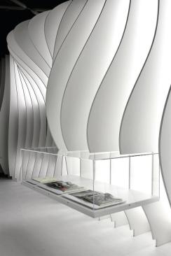 A+finned+structure+houses+projectors+for+multimedia+displays.