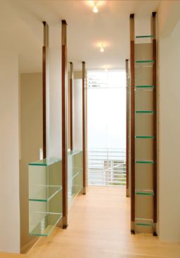 The kit of parts, which includes clear, sandblasted, and louvered glass, transforms the entire house.