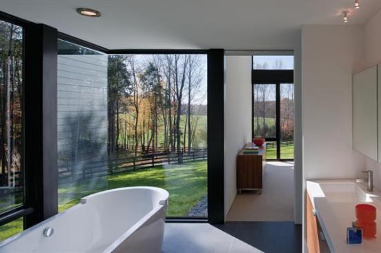 This soaking tub, surrounded by views of nearby woods, makes for a supremely serene master bath.

Project: Becherer House, Charlottesville, Va.; Architect: Robert M. Gurney, Washington, D.C.; Builder: Shelter Associates, Charlottesville, Va.