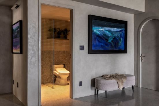 the abstract painting adds a pleasant feeling to the neutral tone