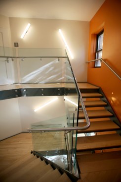 Communication and oversight is enhanced by the open connection to the new entrance
