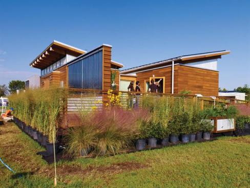 WaterShed features a green-roof system with 156 modular trays for growing sedum plants, and a 42-panel, 9.2-kilowatt PV array with individual microinverters.