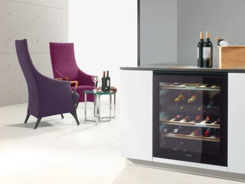 With enough space to hold as many as 38 bottles, this under-counter wine storage unit features two independently controlled cooling zones and interior LED lights. 
www.miele.com.