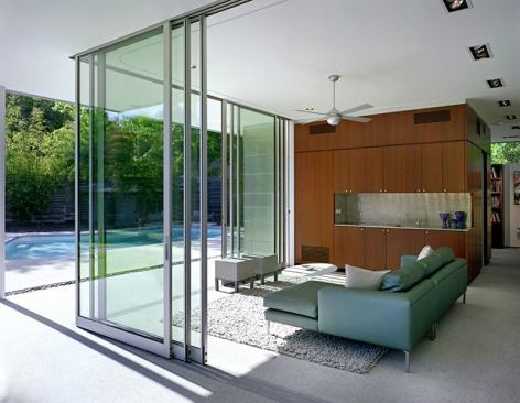 CHDA 2008 – Accessory Building / Merit Award  Architect: Steinbomer & Associates Architects, Austin, Texas; Builder: MG Construction Works, Austin   Packing an oversized programmatic wallop, this 620-square-foot pavilion serves as the owners' pool house, guest house, office, ancillary art gallery (they're art dealers), retreat, and entertainment space. And if that weren't enough, the pavilion also improves the view from the great room of their 1950s ranch house.