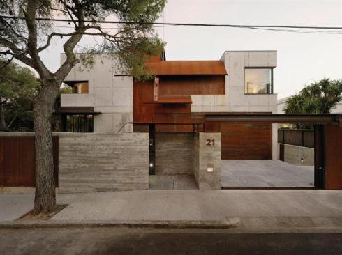 The Sitges Studios walled entry courtyard draws on local tradition.
