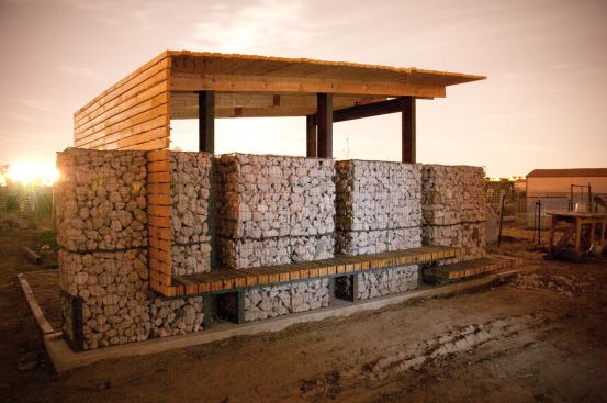 Studio H:T's Brad Tomecek and Christopher Hill led the 2010 University of Colorado Design Build studio, which constructed this pavilion, used for milking cows, as part of a larger project for the local nonprofits Feed Denver and The Urban Farm at Stapleton.