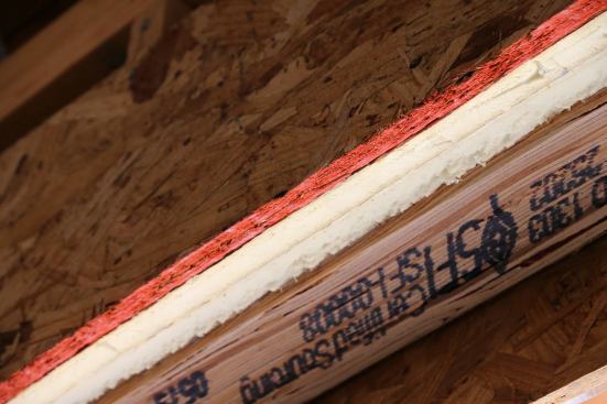 Looking up at a R-10 Insulated Header using 2 layers of 3/4" R-5 rigid foam.