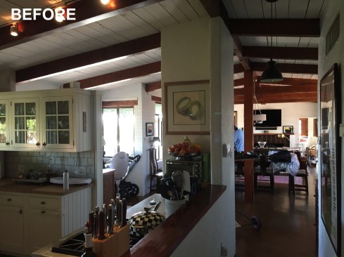 In the original main living space, a narrow hallway and an outdated, small, closed-in kitchen posed challenges. Recognizing the need for more space, the homeowner embarked on a journey of transformation.