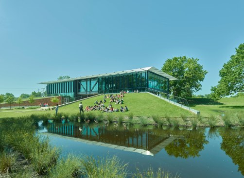The Visitor Center reflects the park and beautiful delta landscape. The  berm acts as lawn theater for park events with views focused back to the historic courthouse. 
