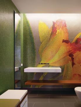 The powder room wall features a pixilated photo of the client’s favorite orchid, rendered in ceramic tile.