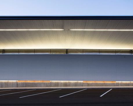 During the winter months, exposed fluorescent strips serve as exterior task lighting for the purposes of dawn and dusk loading duties.