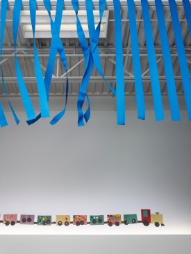 Blue ceiling ribbons with movement and wall uplight