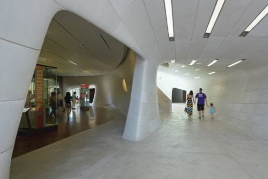Inside%2c+in+the+public+spaces%2c+cast-stone+walls+give+way+to+Italian+floor+tile+from+Flor+Gres.+In+the+first-floor+galleries%2c+which+hold+exhibits+related+to+the+Sports+Hall+of+Fame%2c+the+tile+transitions+to+warm+wood+from+Allegheny+Millwork.