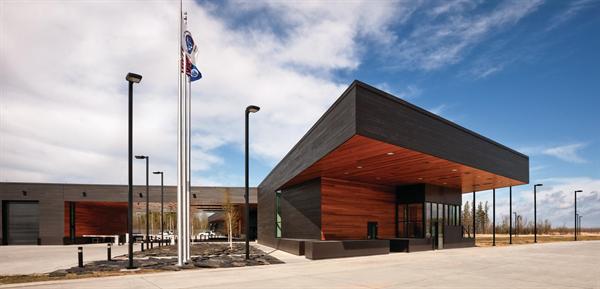 Public lobby and officer work area. All millwork is made from reclaimed cutoffs from the exterior siding.