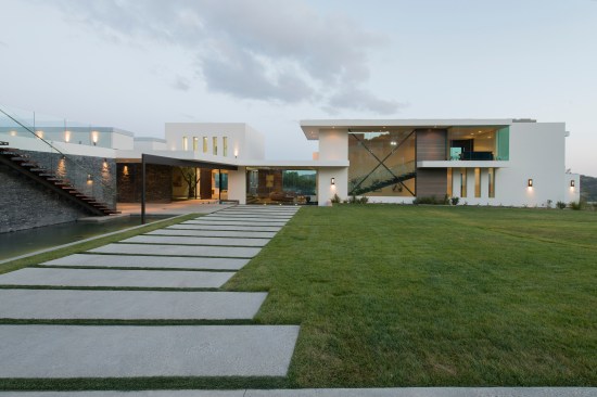 Benedict Canyon Beverly Hills modern mansion entrance driveway and landscaped walkway