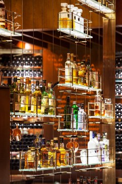 Custom hanging illuminated, structural bar shelving, Tim Barry Design, Touchstone BuildingCustom hanging illuminated, structural bar shelving, Tim Barry Design, Touchstone Building