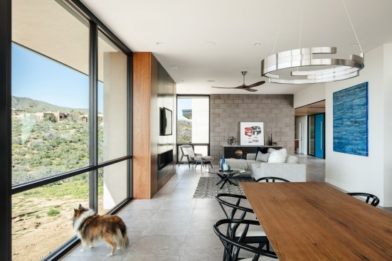 View looking from the dining area back towards the living area and entry.