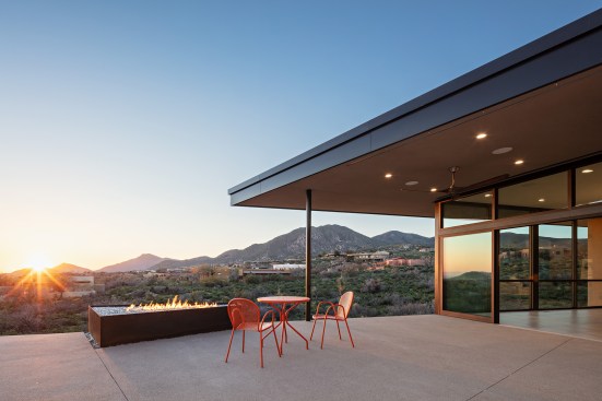 A large roof overhang helps protect the glass area from the harsh Arizona sun.