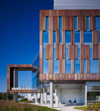 From the north campus, the sky gate is a clear symbol of connectivity. The red-brick colored metal panels relate to the predominately brick campus while introducing a modern architectural vocabulary.  