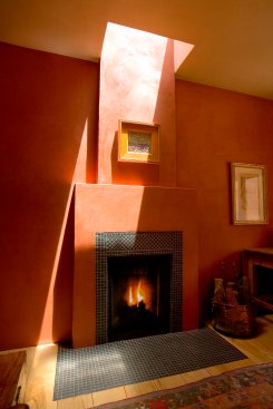Mandeville Canyon modern home custom fireplace with skylight overhead