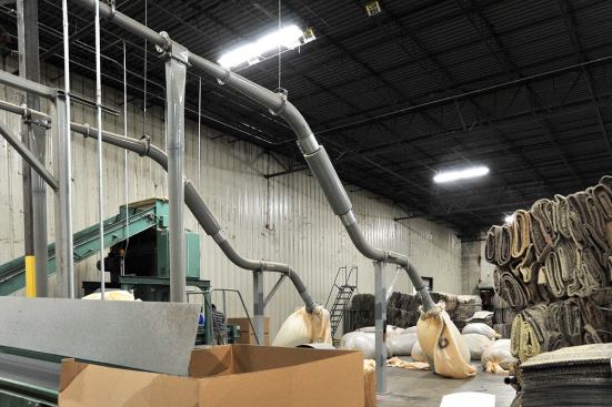 Machines separate and gather the post-consumer carpet fibers from&nbsp;its backing.