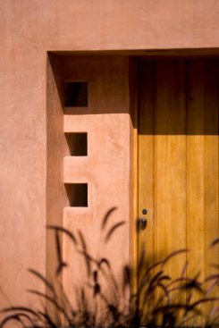 Mandeville Canyon modern home front door entryway with portal windows